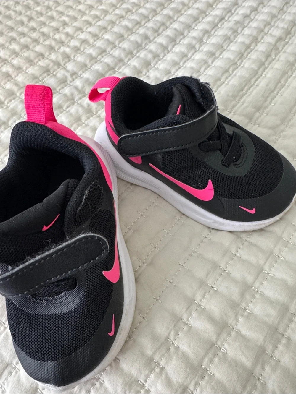 Nike Kids Black Sneakers with Pink Swoosh